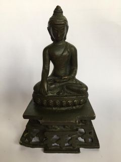 1984 Buddha statuette by Don Cherry, New York